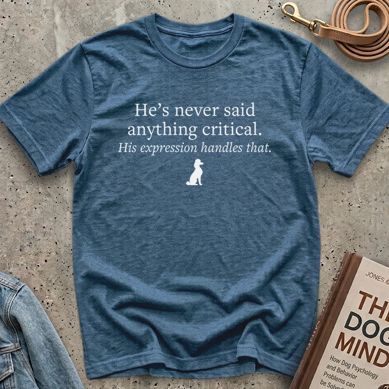 His expression handles that. - Unisex Tee